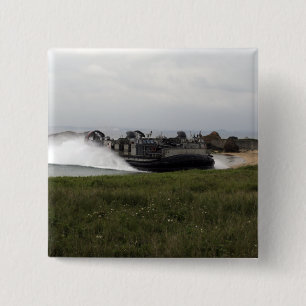 A landing craft air cushion comes ashore 2 inch square button
