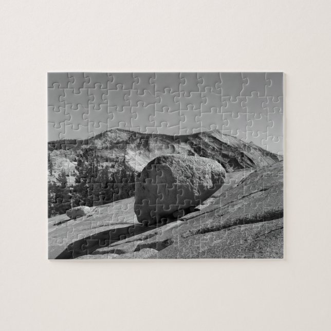 A large boulder - a glacial erratic - is perched jigsaw puzzle (Horizontal)