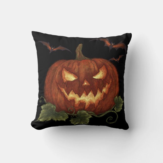 A large pumpkin with glowing eyes and bats throw pillow (Front)