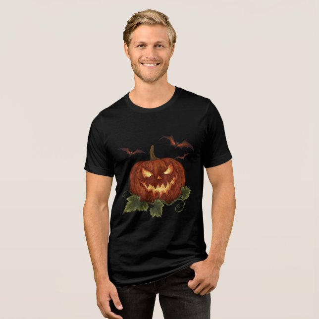 A large pumpkin with glowing eyes and bats Tri-Blend shirt (Front Full)