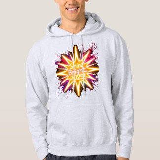 A large starburst glowing in neon light hoodie