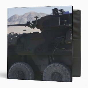 A light armoured vehicle fires binder