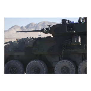 A light armoured vehicle fires photo print