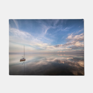 A Lone Sailboat On The Calm Waters Of Salton Doormat