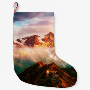 A look at the sunlit hills at twilight. Dramatic e Small Christmas Stocking