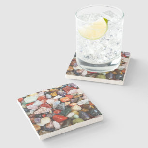 a lot of beautifully coloured stones stone coaster