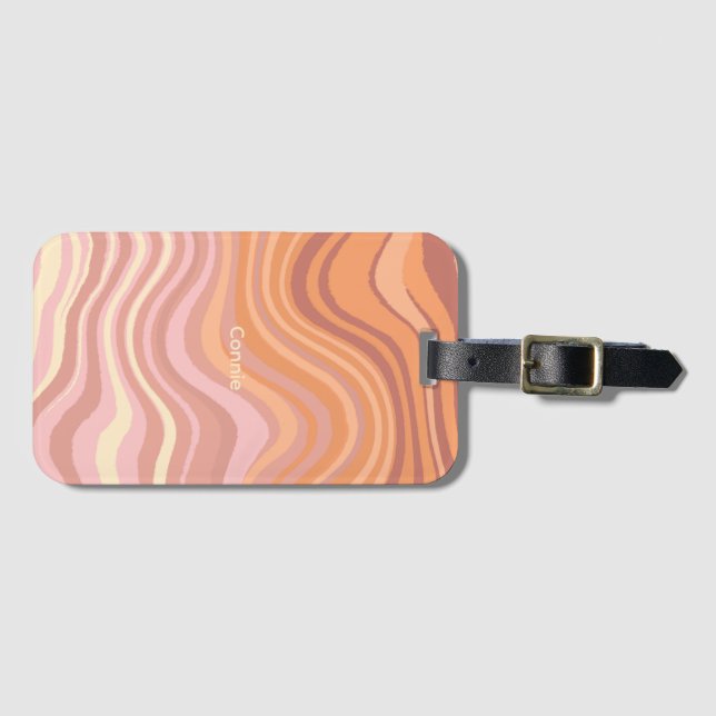 A luggage tag with sunset colours in waves. (Front Horizontal)