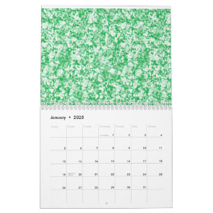 A lush, green fern with delicate, arching fronds f calendar