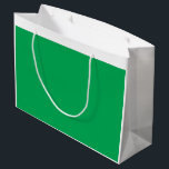 A lush green fern with delicate, intricately patte large gift bag<br><div class="desc">Behold the enchanting sight of a vibrant green fern, its delicate and ornate leaves creating a mesmerizing display of natural beauty. This image is sure to bring a sense of tranquillity and sophistication to your decor.</div>