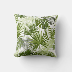 a lush, tropical leaf pattern throw pillow