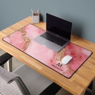 A luxurious pink marble background desk mat
