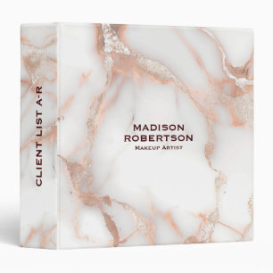 A luxurious rose-gold marble background binder