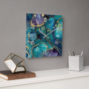 A luxurious rose-gold marble background square wal wall clock