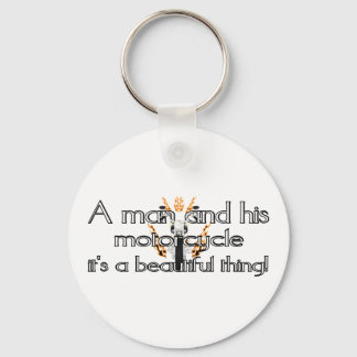 A man and his motorcycle keychain