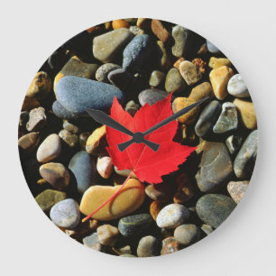 A Maple leaf on a Rock Background Large Clock