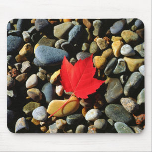 A Maple leaf on a Rock Background Mouse Pad