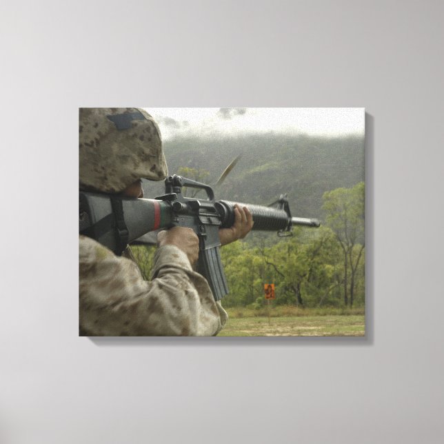 A Marine conducts drills Canvas Print (Front)