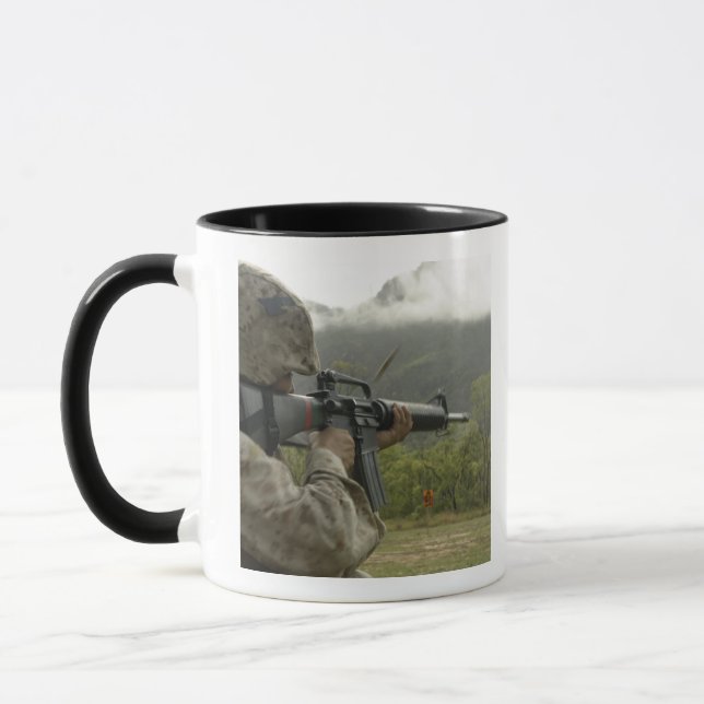 A Marine conducts drills Mug (Left)