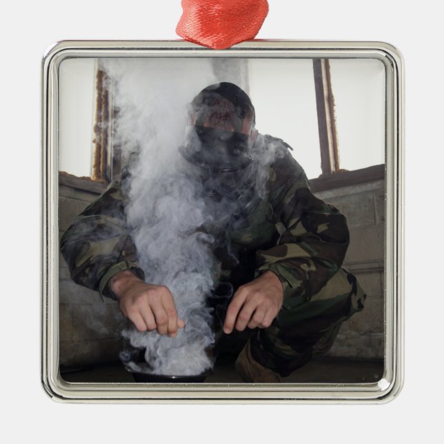 A marine fills the gas chamber with more CS gas Metal Ornament (Front)