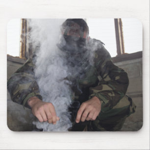 A marine fills the gas chamber with more CS gas Mouse Pad