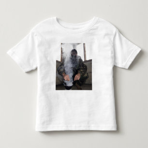 A marine fills the gas chamber with more CS gas Toddler T-shirt