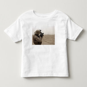 A Marine fires the M-32 Toddler T-shirt