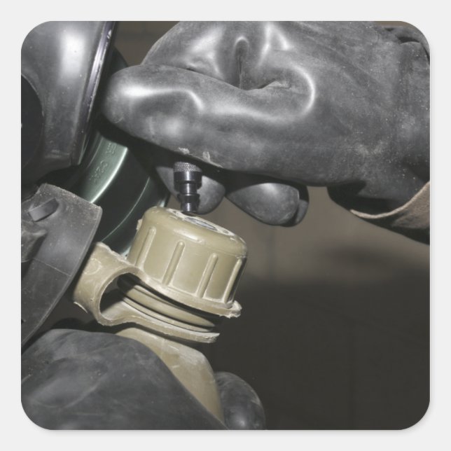 A Marine inserts a drinking tube into his cante Square Sticker (Front)