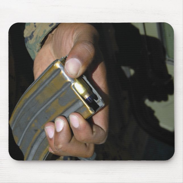 A Marine loads blank ammunition rounds Mouse Pad (Front)