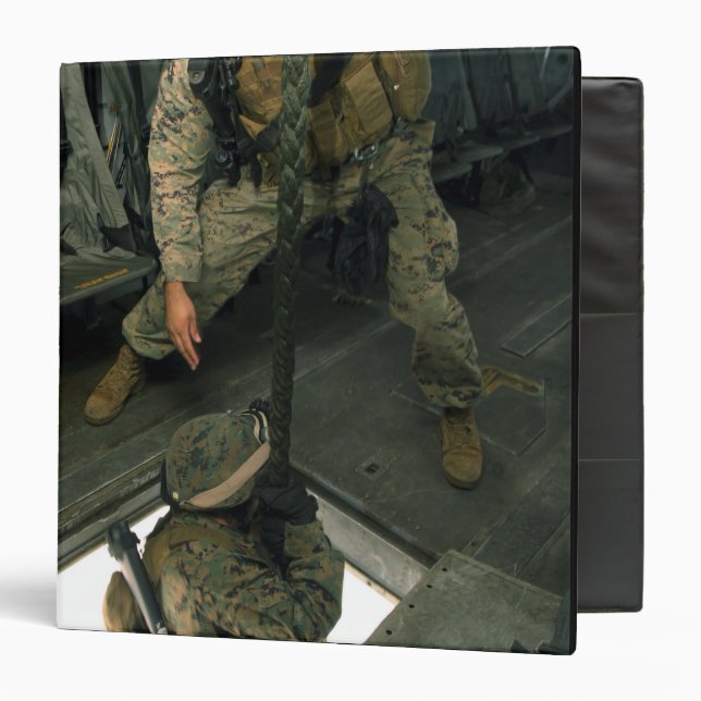 A Marine sends a fellow Marine down the hell ho Binder (Front/Inside)