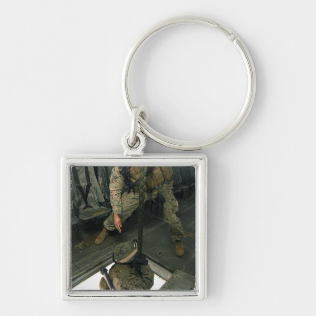 A Marine sends a fellow Marine down the hell ho Keychain (Front)