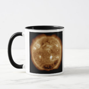 A massive X-class solar flare erupts on the Sun Mug
