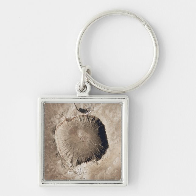 A meteorite impact crater keychain (Front)