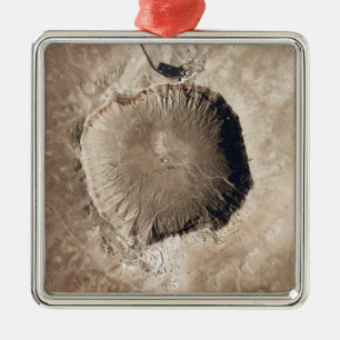 A meteorite impact crater metal ornament