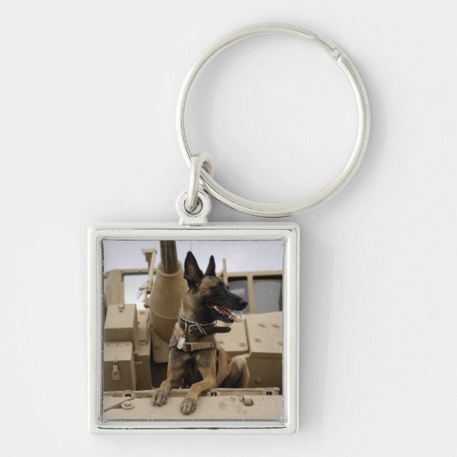 A military working dog sits on a M2A3 Keychain (Front)