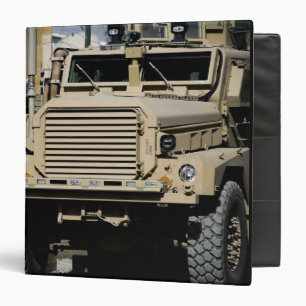 A mine-resistant, ambush-protected vehicle binder