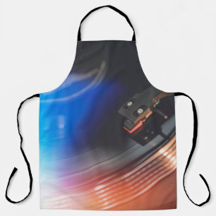 A modern turntable to play music on audio disc. Hi Apron