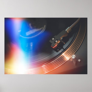 A modern turntable to play music on audio disc. Hi Poster