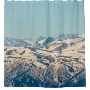 A mountain range with thawing snow and ice in the 
