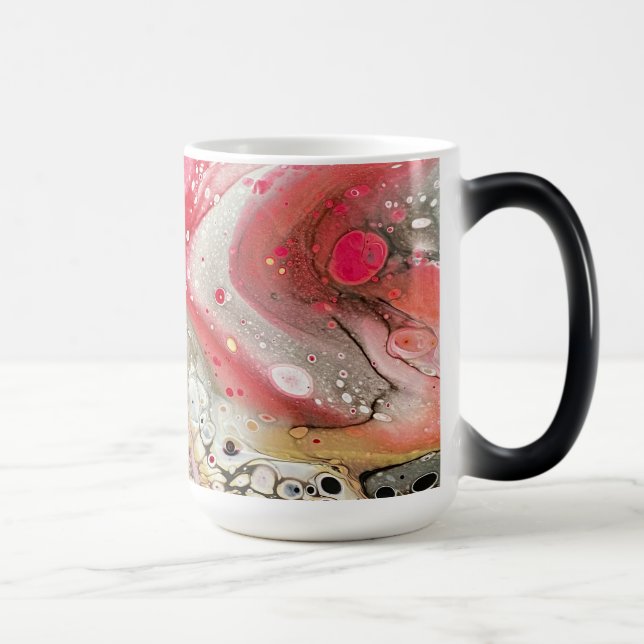 A mug with pink, gold, and black colours (Right)