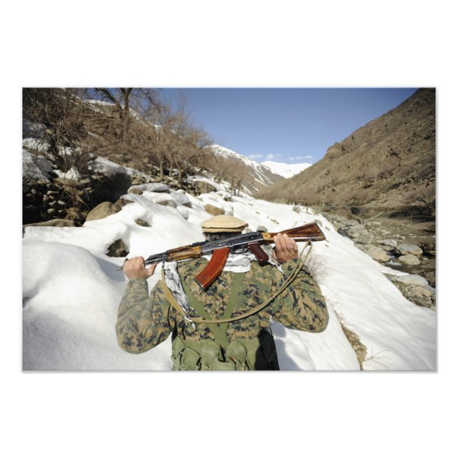A Mujahadeen Guard walks with US Military membe Photo Print (Front)