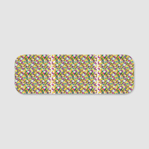 a multicolored background with squares and dots name tag
