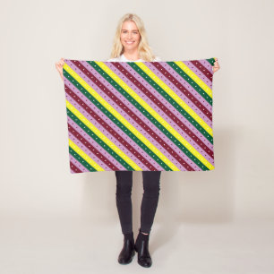 a multicolored striped pattern with dots fleece blanket