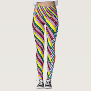 a multicolored striped pattern with dots leggings