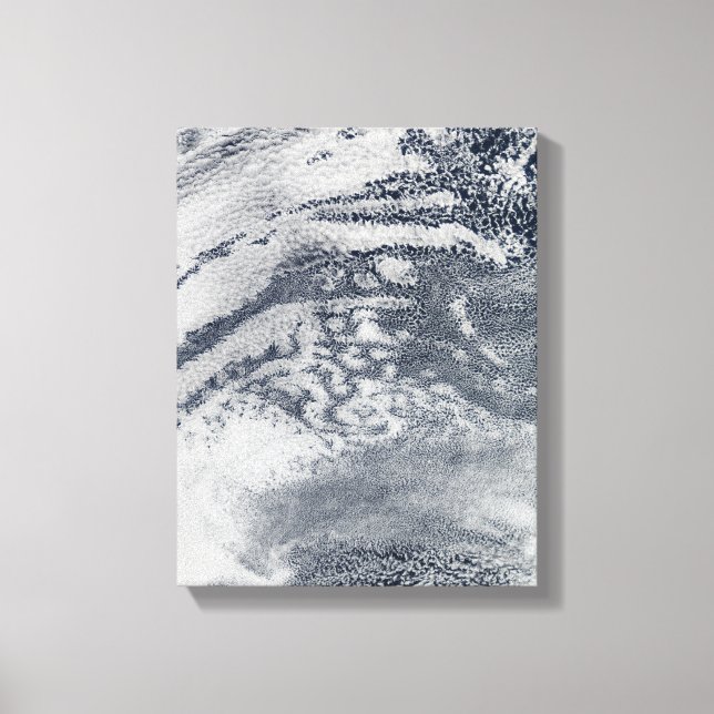 A network of clouds over the Pacific Ocean Canvas Print (Front)
