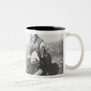 A Nurse Tending a Wounded Man Two-Tone Coffee Mug