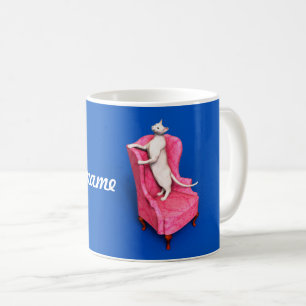 A oriental cat on a armchair coffee mug
