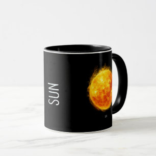 A painting of the sun in a space mug