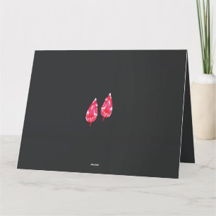a pair of red leaves on a black background thank you card