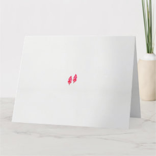 a pair of red leaves on a black background thank you card