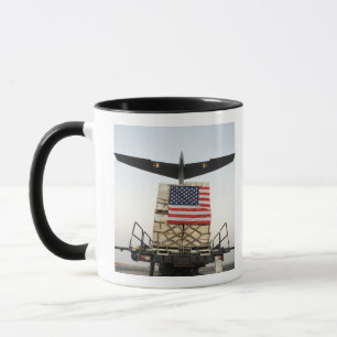 A pallet containing humanitarian relief supplie mug